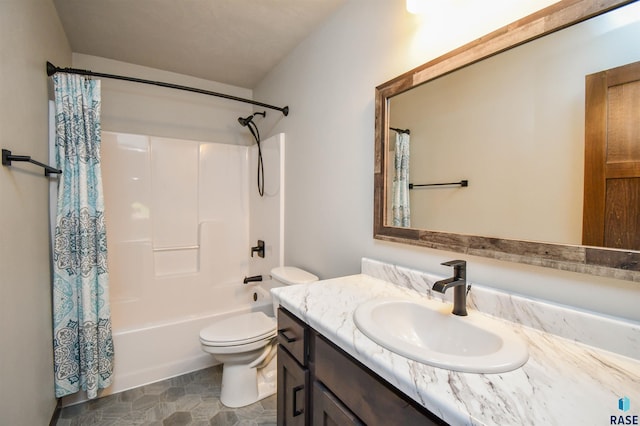 full bathroom with tile patterned flooring, shower / tub combo, vanity, and toilet