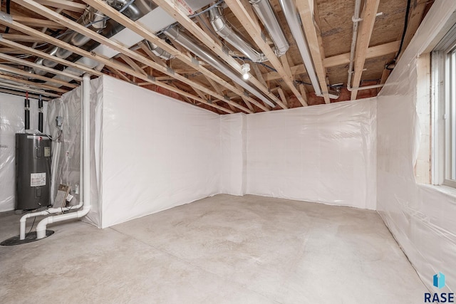 basement featuring electric water heater