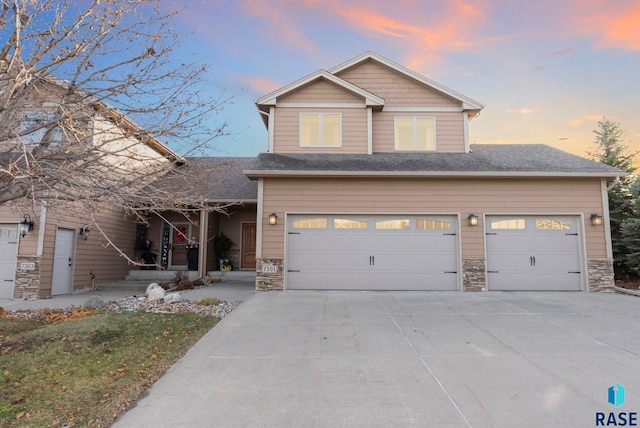 view of front of property with a garage