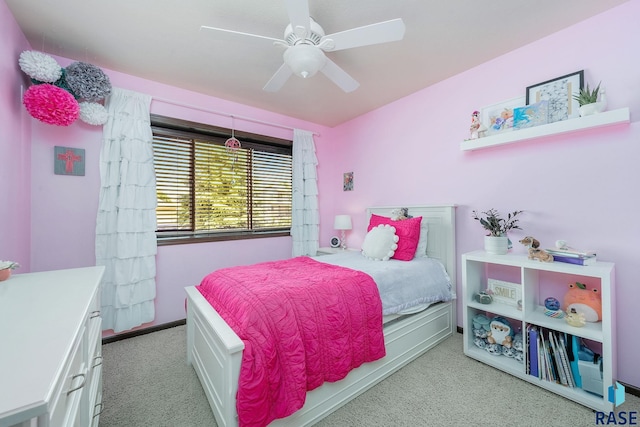 bedroom with ceiling fan and light carpet