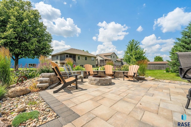 view of patio / terrace with an outdoor fire pit