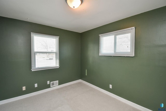 view of carpeted spare room