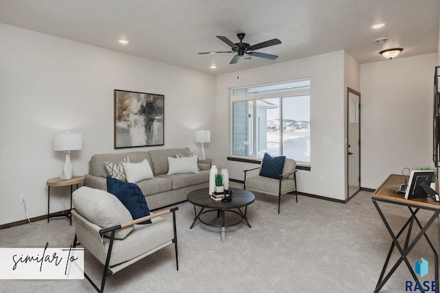 living room with light carpet and ceiling fan