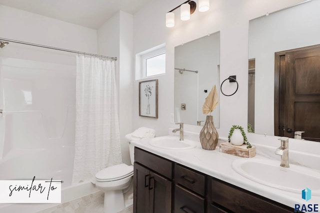 bathroom with a shower with shower curtain, vanity, toilet, and tile patterned flooring