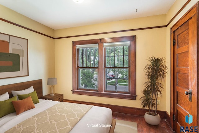 bedroom featuring hardwood / wood-style floors