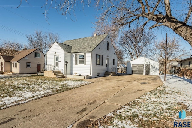 view of front of home with an outbuilding and a garage