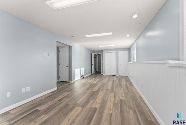 unfurnished room featuring hardwood / wood-style floors