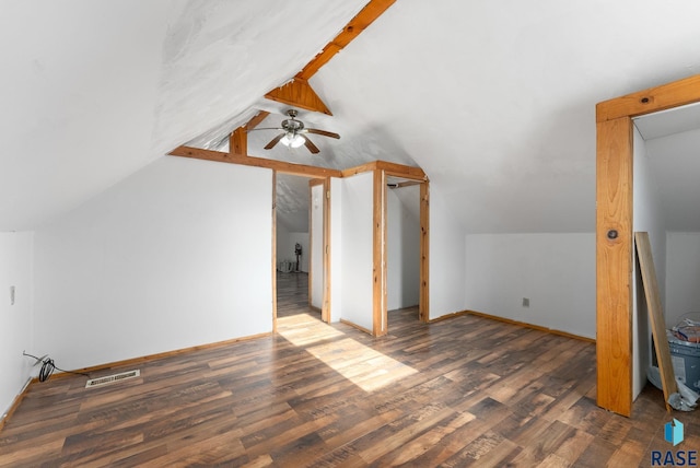 additional living space with ceiling fan, dark hardwood / wood-style flooring, and lofted ceiling