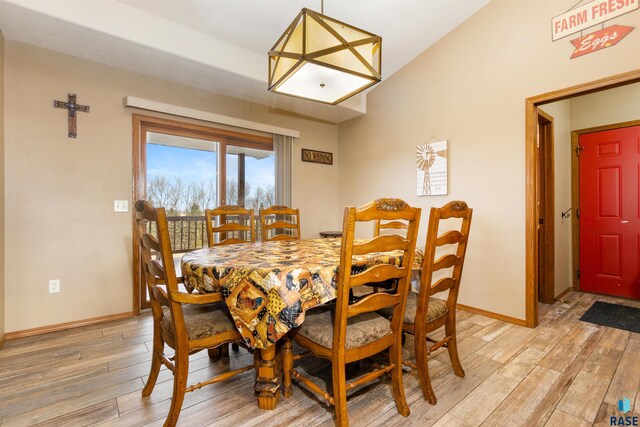 dining room featuring light hardwood / wood-style flooring