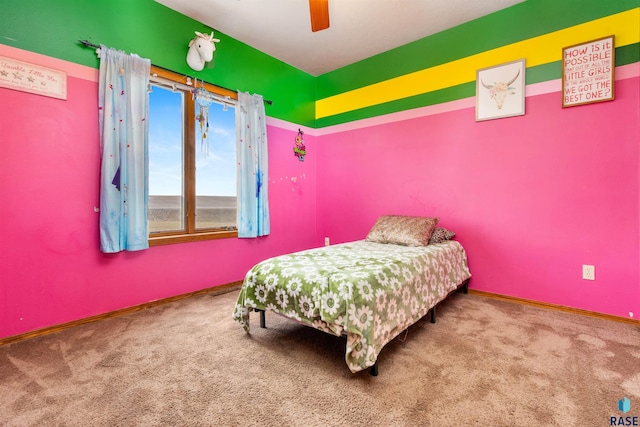 carpeted bedroom featuring ceiling fan