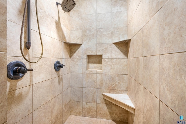 details featuring tiled shower