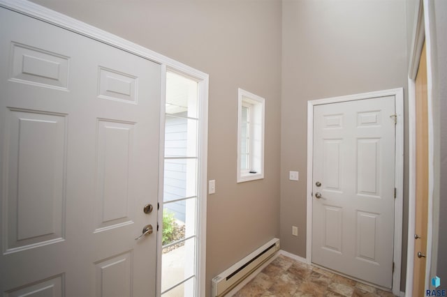 entrance foyer featuring a baseboard radiator