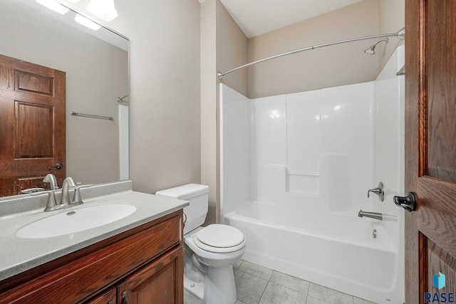 full bathroom featuring tile patterned floors, vanity, toilet, and shower / washtub combination