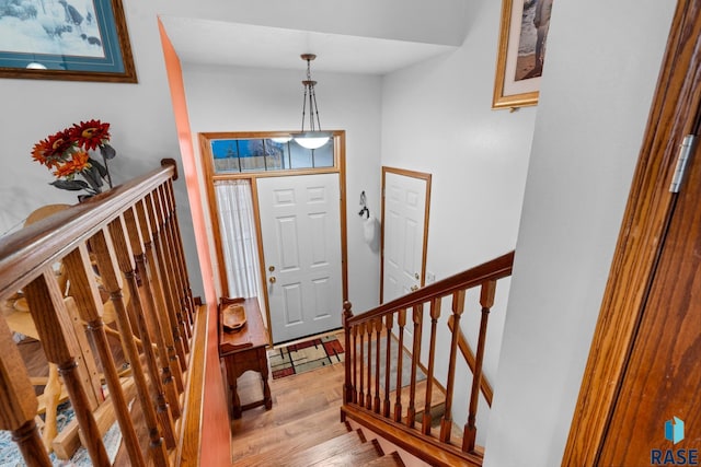 foyer entrance with light wood-type flooring