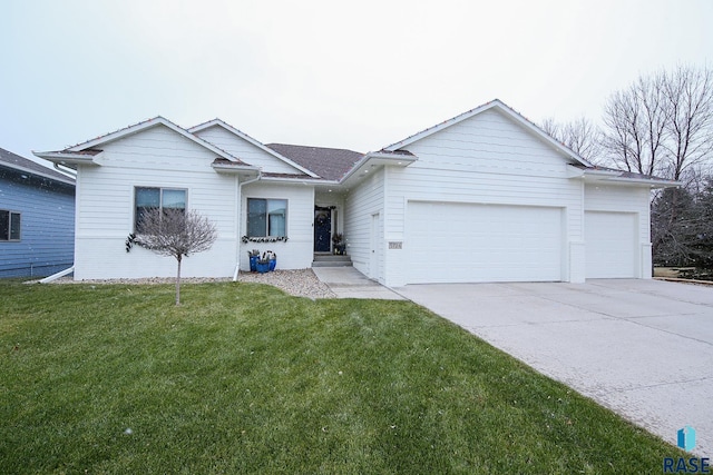 single story home featuring a front lawn and a garage