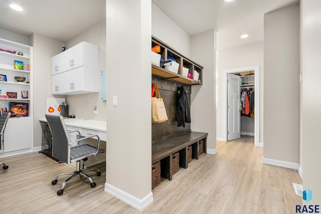 mudroom featuring light wood-type flooring