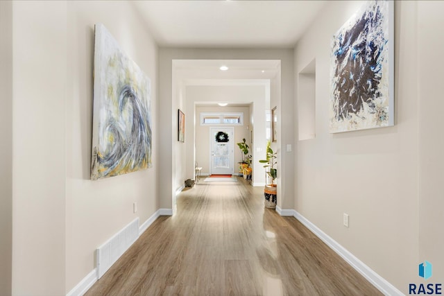 hall featuring light hardwood / wood-style floors