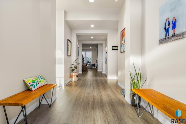 corridor featuring hardwood / wood-style floors