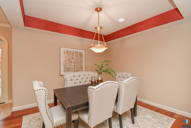 dining room with wood-type flooring