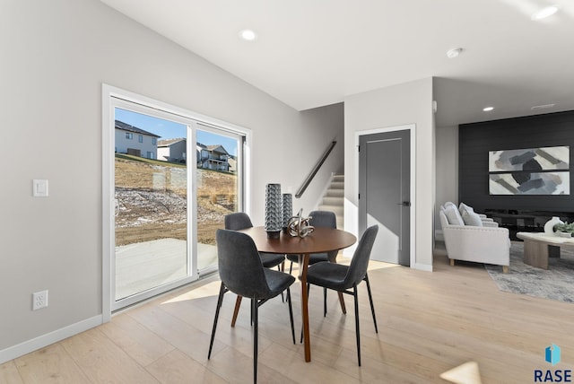 dining space featuring light hardwood / wood-style floors