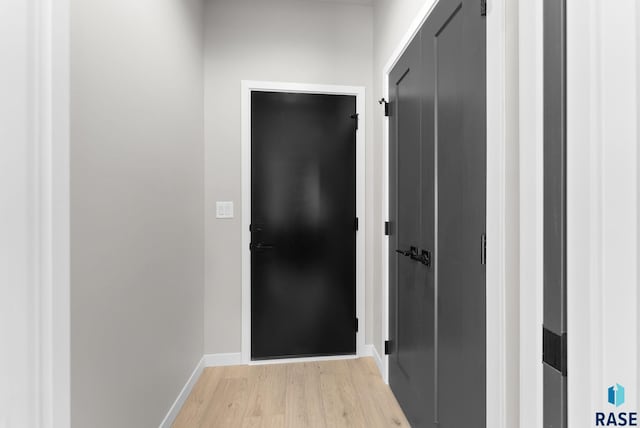 hallway featuring light wood-type flooring