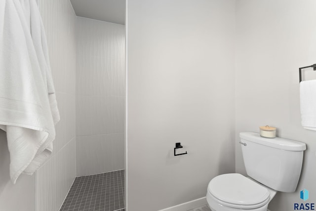 bathroom with tile patterned floors and toilet