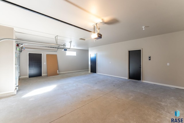 garage featuring a garage door opener