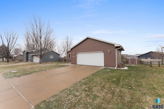 view of property exterior with a garage, a storage shed, and a lawn