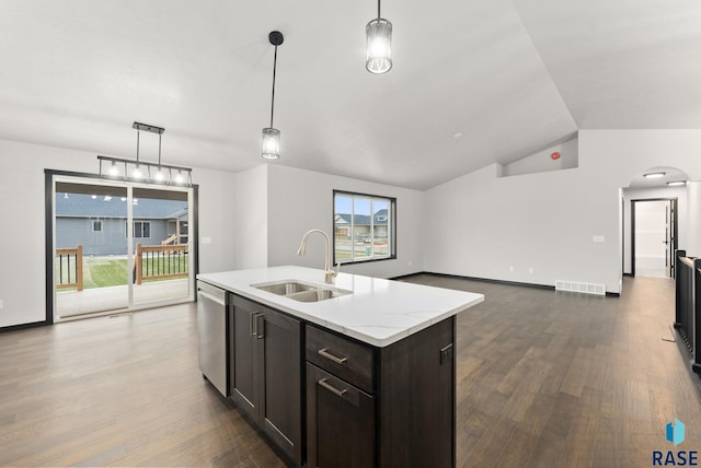 kitchen with hardwood / wood-style floors, dishwasher, sink, and hanging light fixtures