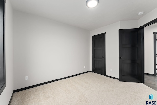 unfurnished bedroom featuring carpet floors