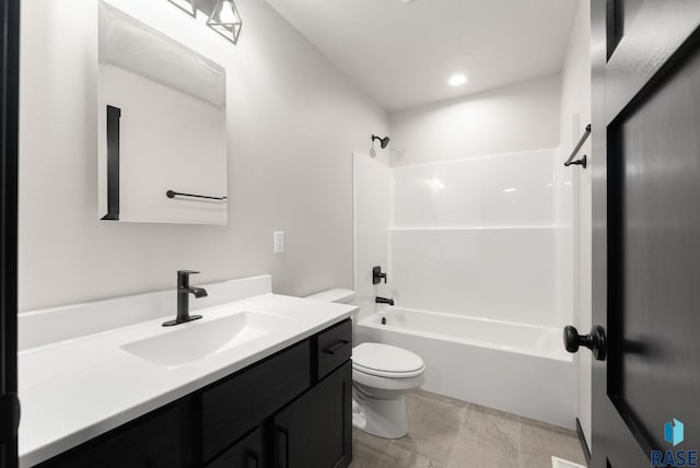 full bathroom featuring vanity, shower / bath combination, and toilet