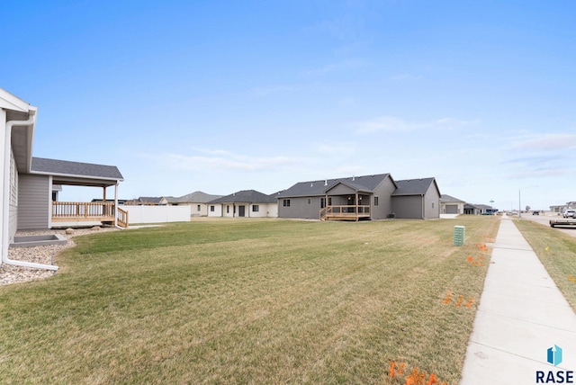 view of yard featuring a deck