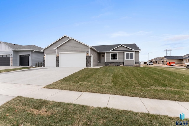 ranch-style home with a front yard and a garage