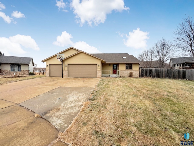 ranch-style house with a front lawn and a garage