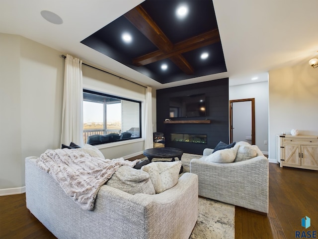 living room with a fireplace, dark hardwood / wood-style floors, beamed ceiling, and coffered ceiling