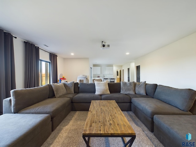 living room with light colored carpet