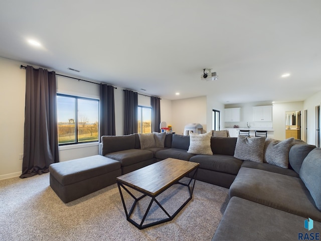 living room with light carpet