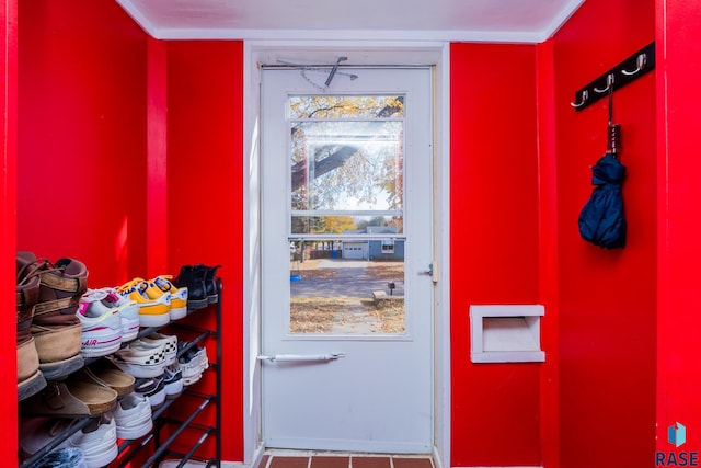 doorway featuring tile patterned flooring