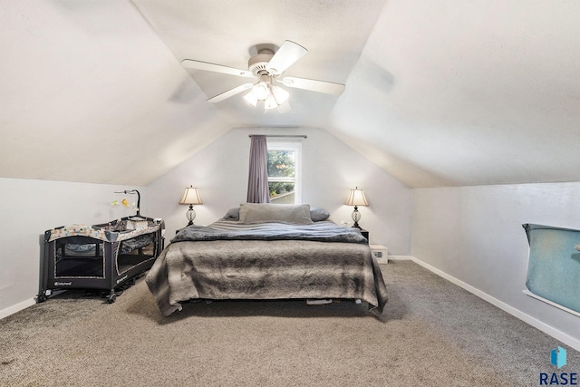 bedroom featuring ceiling fan, carpet floors, and vaulted ceiling