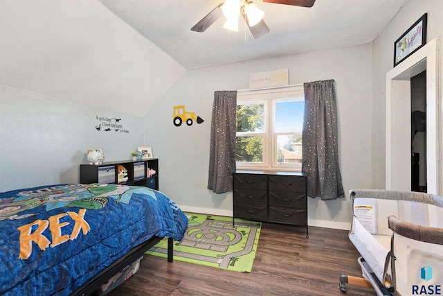 bedroom featuring dark wood-type flooring, ceiling fan, and lofted ceiling