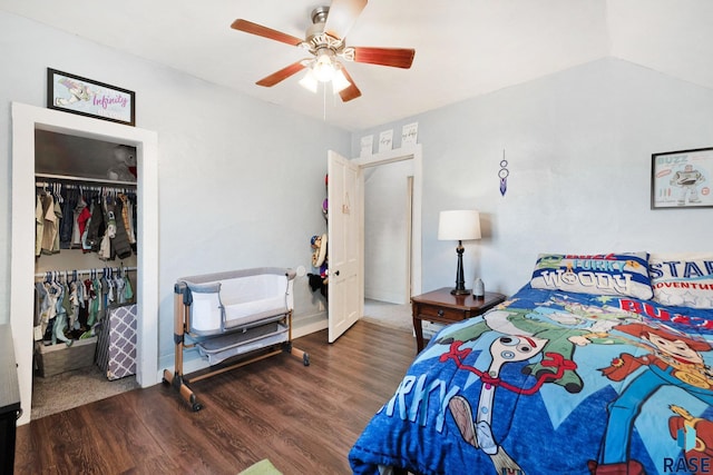 bedroom featuring a closet, vaulted ceiling, ceiling fan, and dark hardwood / wood-style floors