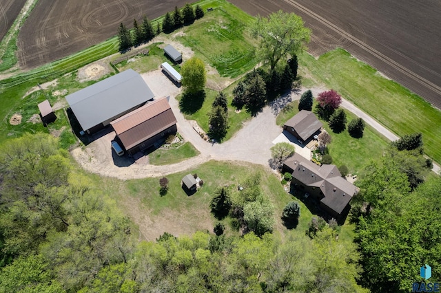 birds eye view of property featuring a rural view