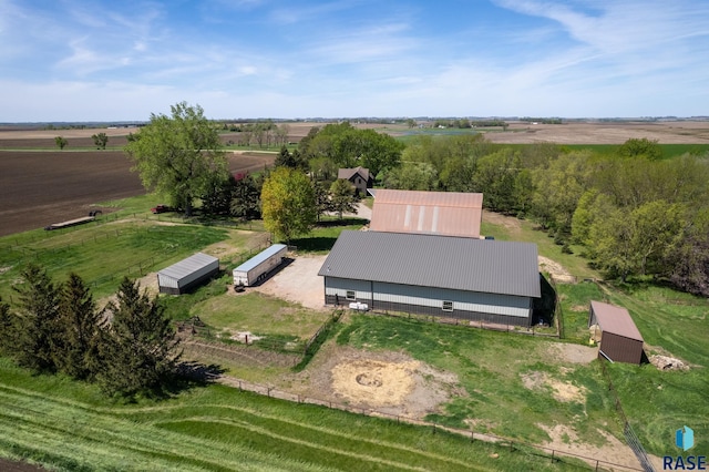 birds eye view of property featuring a rural view