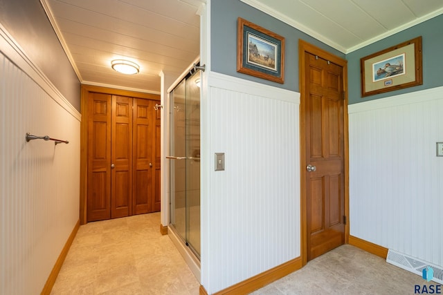 hallway with crown molding