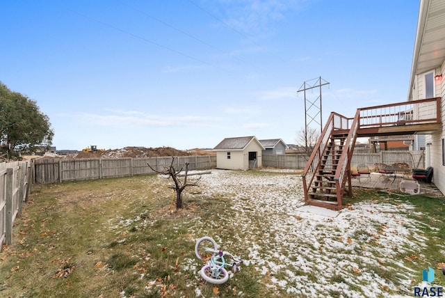 view of yard with a patio area and a wooden deck