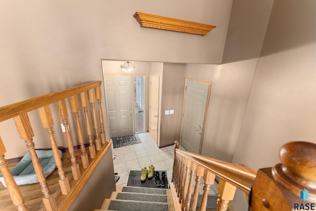 staircase with tile patterned flooring