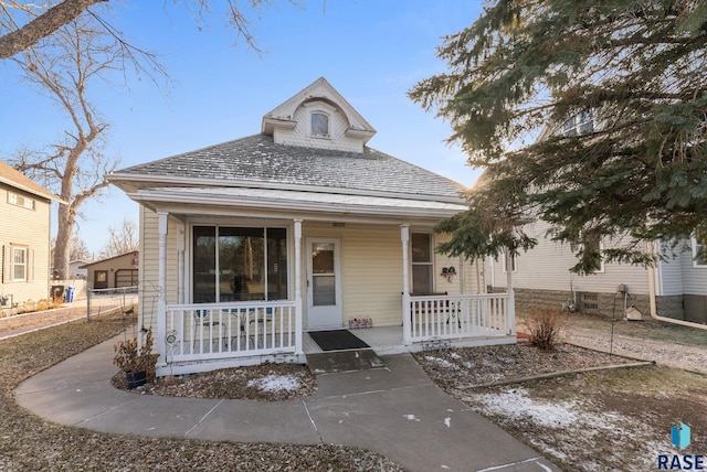 view of front of home featuring covered porch