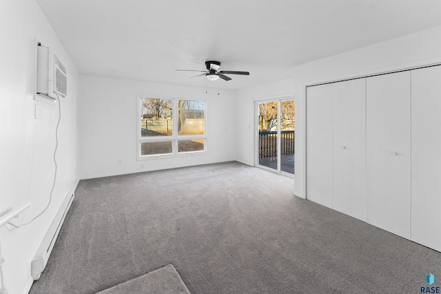 unfurnished bedroom with carpet, a baseboard heating unit, ceiling fan, access to exterior, and a closet