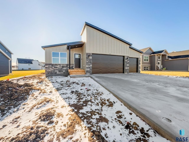 view of front of property with a garage