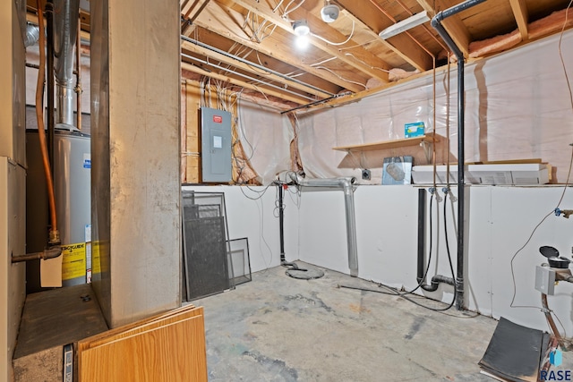 basement with electric panel and gas water heater